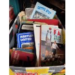 A collection of football programmes, annuals yearbooks and handbooks.
