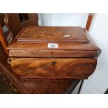 A 19th century mahogany sewing box.