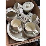 A box of Hornsea Corn Rose dinner wares