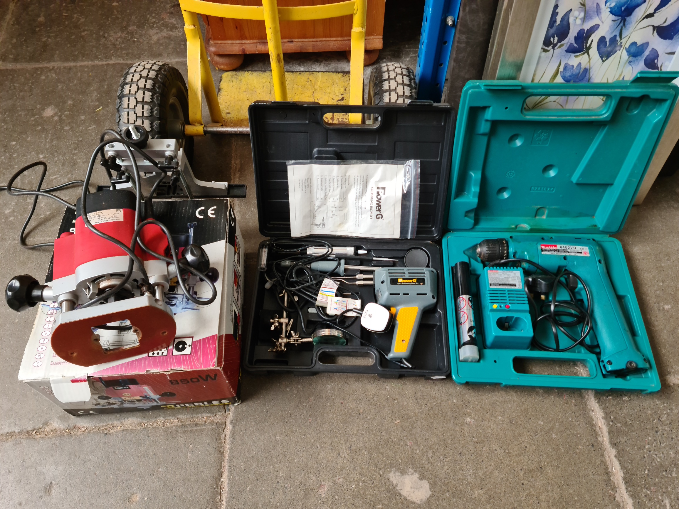 Various tools to include electric router, a cased Makita drill and a soldering iron kit / set.
