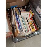 A box of assorted comedy books including The Goonies, The Goodies, Spike Muligan etc.