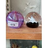 Two Caithness glass paperweights, Starlight and Oriental