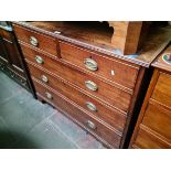 A George III mahogany chest of drawers, standing on bracket feet, width 112cm.
