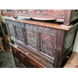 An 18th century carved oak coffer.
