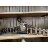 A Tasmanian wooden carved figure "Blind drummer" , length 75cm.