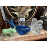 A quantity of glass animal paperweights including Wedgwood etc.