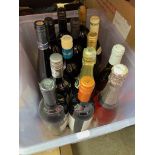 A box containing 14 bottles of vintage and 21st century wines.