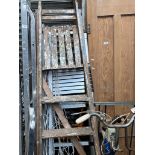 Telescopic ladders, a pair of wooden ladders, a set of wooden steps, a set of aluminium steps and