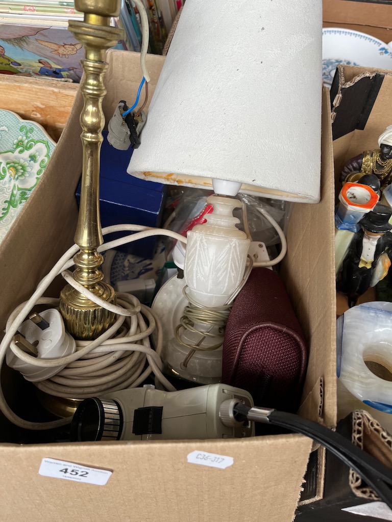 A box of miscellaneous items including boxed Charles and Dianna commemorative mug, lamps, pottery