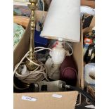 A box of miscellaneous items including boxed Charles and Dianna commemorative mug, lamps, pottery