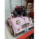 A pink battery operated car and a RC monster truck - no remote.