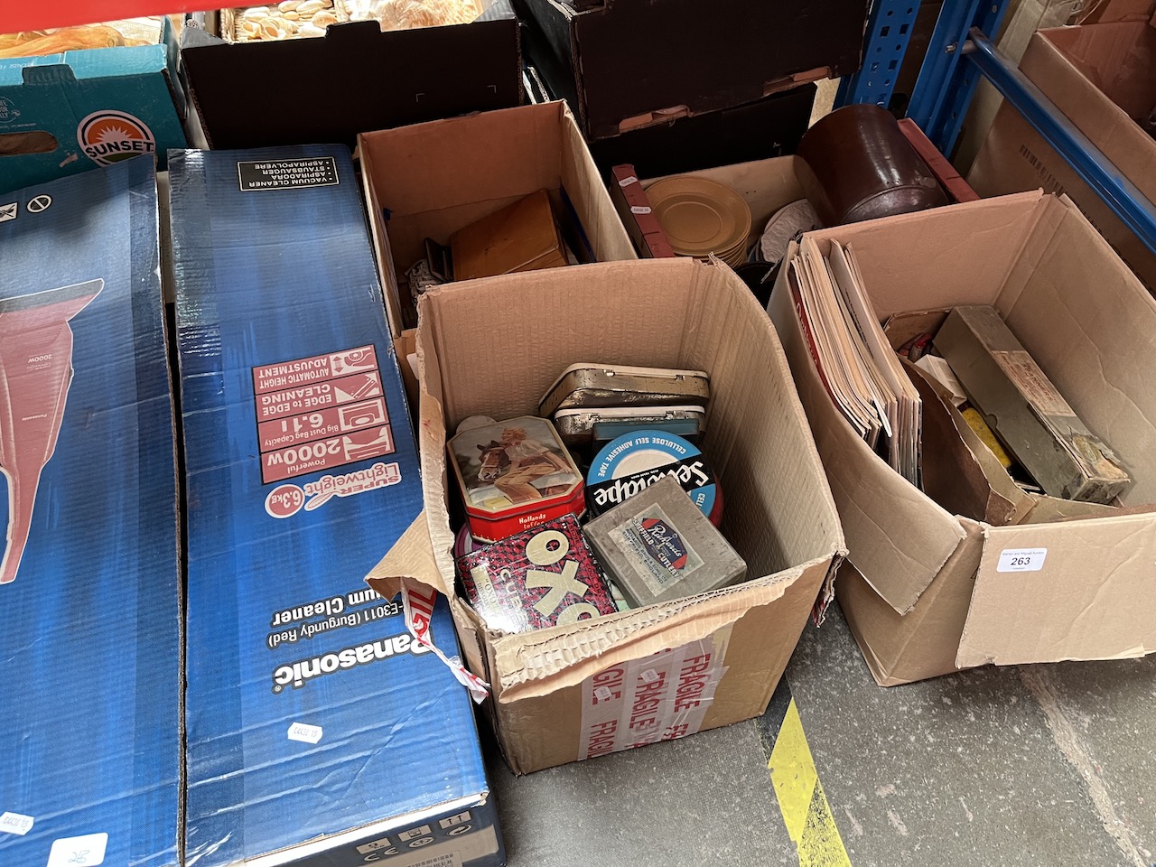 4 boxes of miscellaneous to include vintage sports equipment, some porcelain, stoneware jug, vintage