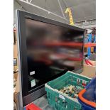 A 40" Sony LCD colour TV with remote and 2 boxes of misc electrical items including steam irons,