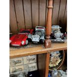 3 model cars.