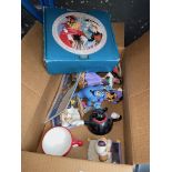 A collection of Walt Disney character figures and related items.