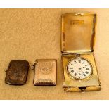 A silver pocket watch case holder, having hallmarks for 1912, London, a silver vesta case,