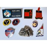 A group of 9 motorcycle pin badges