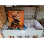 A vintage case containing approximately 19 records including David Bowie, The Beatles, Thelonius