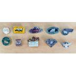 A group of 10 motorcycle pin badges