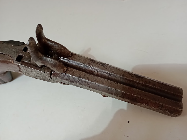 An antique double barrelled pistol with drop down triggers. - Image 5 of 6