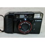 A Canon AF35M II camera with Canon lens 38mm 1:2.8, auto focus.