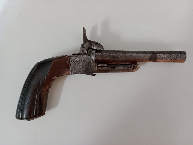 An antique double barrelled pistol with drop down triggers. - Image 2 of 6