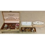 A jewellery box containing various jewellery to include some silver, costume jewelery, yellow metal,