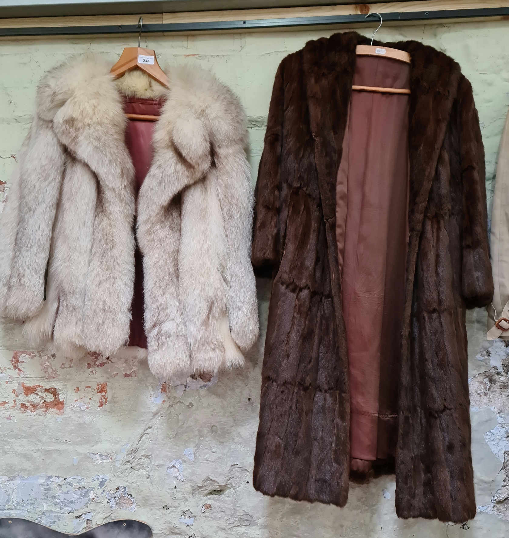 A vintage white fox fur jacket & a mink coat