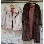 A vintage white fox fur jacket & a mink coat