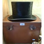 A Vintage silk top hat with case by Woodrow.