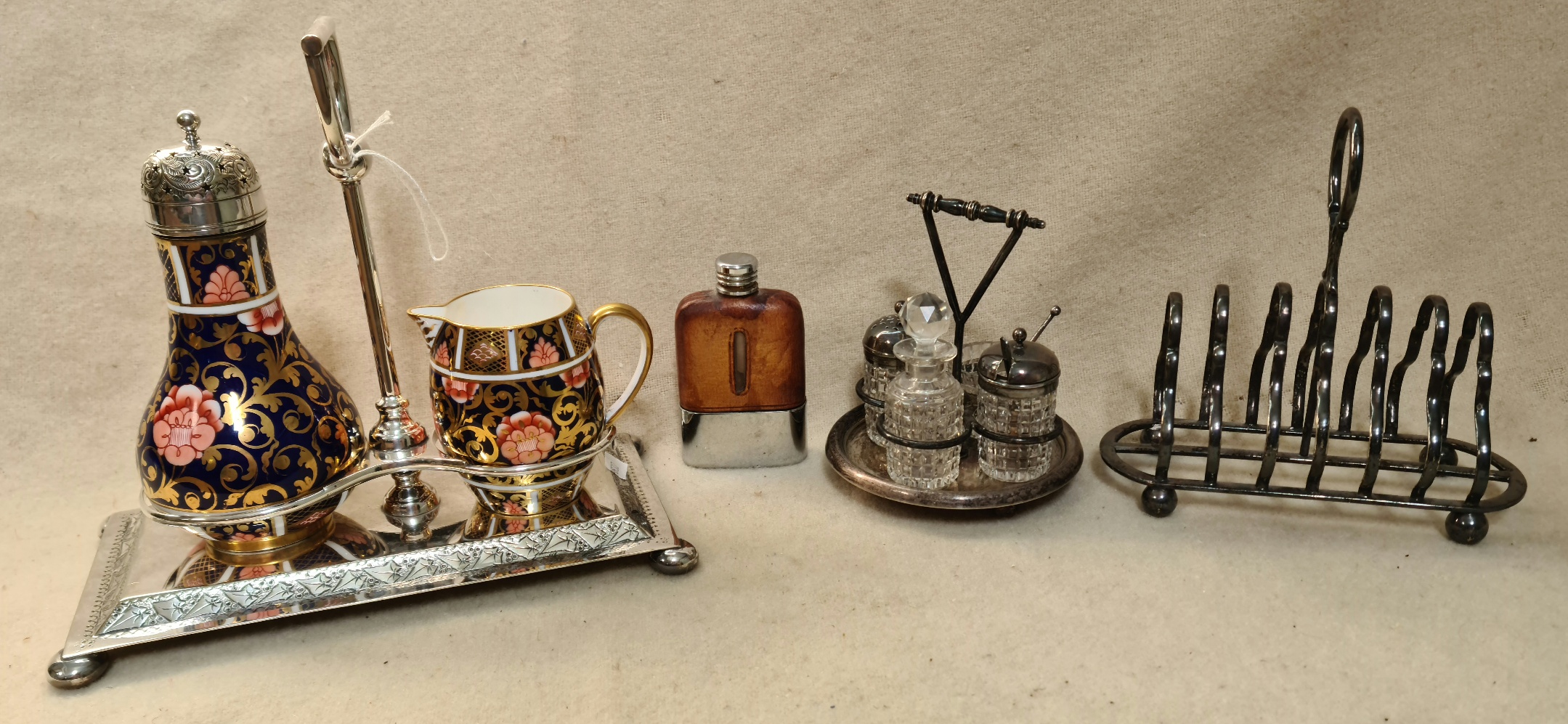 A lot of silver plated items including a sectional cruet set with handle, Philip Ashberry & Son,