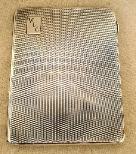 An Art Deco silver cigarette case, gross weight 132.2 grams.