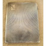 An Art Deco silver cigarette case, gross weight 132.2 grams.