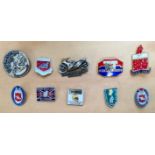 A group of 10 motorcycle pin badges