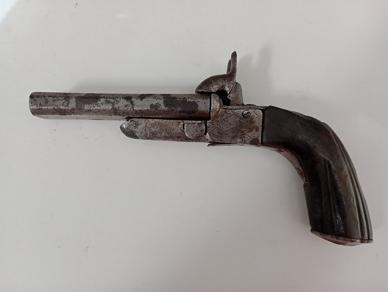 An antique double barrelled pistol with drop down triggers. - Image 3 of 6