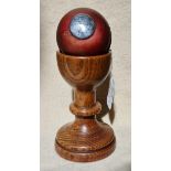 A Victorian cricket trophy, mounted ball on stand.