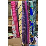 A collection of men's ties including designer and silk examples including Gucci, Hermes, Georgio