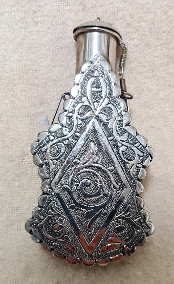 A white metal middle Eastern flask, gross weight 78.3 grams.