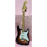 A vintage Kasuga strat copy electric guitar with hard case.