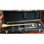 A Trombone in brass with hard case