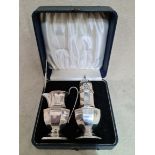 A cased silver sugar castor and cream jug, both by Viner's Ltd ( Emile Viner ), Chester, 1936 and