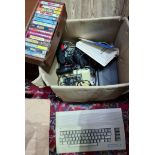 A vintage Commodore 64 computer with accessories and games etc.