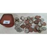A collection of coins including George V and George VI silver shillings, dated between 1920 and