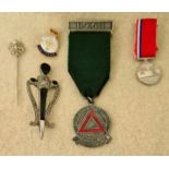 A lot of miscellaneous collectables including a 1961 Safe Driving medal, a white metal tie pin, "The