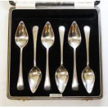 A cased set of six hallmarked silver grapefruit spoons, wt. 131.3g.
