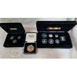 A Pobjoy Mint Isle of Man silver proof coin set, a Pobjoy Mint Isle of Man proof £1 set plus one