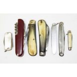 Seven vintage pen knives.