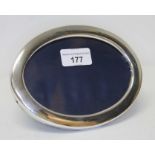 A hallmarked silver oval photograph frame 18.5cm x 12.5cm.