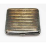 A white metal cigarette case, indistinctly marked, gross weight 118.20 grams.