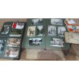 2 albums with a large collection of antique and vintage postcards, collection of cigarette cards,